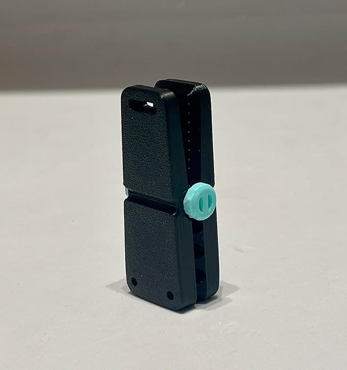 Skullox™ – 4-Magnet Snap Fidget Toy (Black & Turquoise)