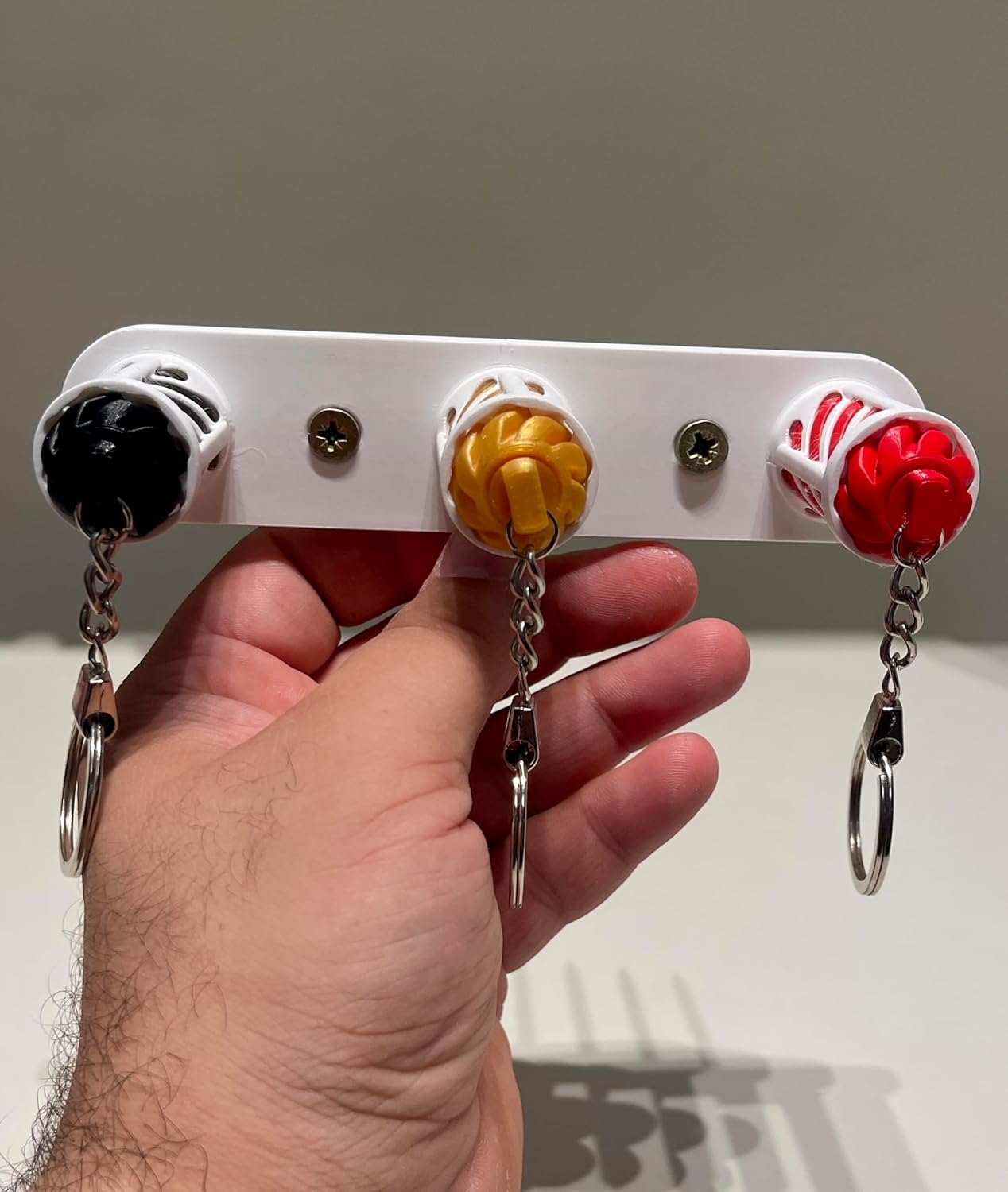 TwistDock Fidget Keychain Wall Mount, 3-Hook Storage Organiser, Red/Gold/Black