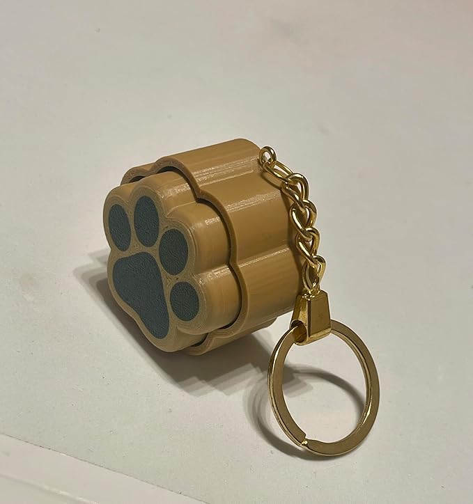 PawPrint™ Fidget Keychain – Black & Gold Sensory Stress Relief Toy, 4.5 cm Compact Design